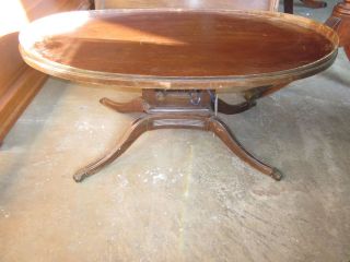 Oval Coffee Table with Harp Style Base