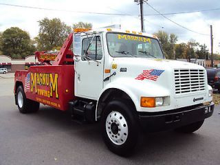 1996 INTERNATIONAL 4900 DT466, 20 TONS CHEVRON HEAVY WRECKER, LOADED 