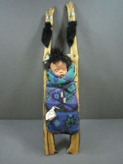   INDIAN BABY IN PAPOOSE CRADLE BACKBOARD FAUX FUR & FEATHERS