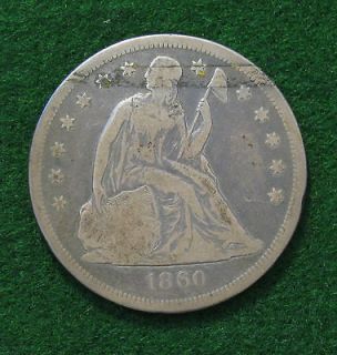 1860 O **VG** Seated Liberty Silver Dollar; Toned