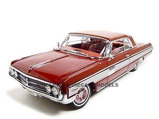 1962 OLDSMOBILE STARFIRE RED 118 DIECAST CAR MODEL BY ROAD SIGNATURE 