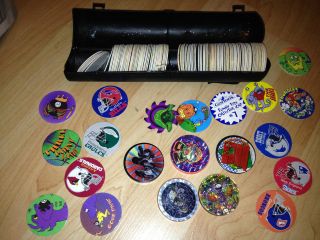 lots of Pogs and 5 Slammers plus carry tube