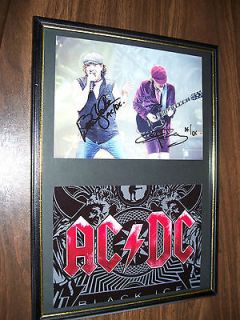 Newly listed LTD EDITION SIGNED FRAMED ACDC ANGUS YOUNG *COA