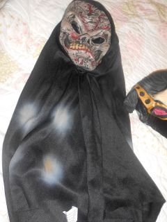 RUBBER MASK WITH LONG CAPE RUBBER MASK W/ GLASSES W/ TINY HOLES TO SEE
