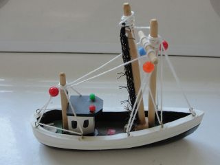   nautical boat, made in Phillipines, string and wood, fishing boat
