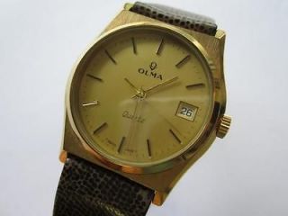 Olma quartz plated dial N.O.S. gents watch runs and keeps time