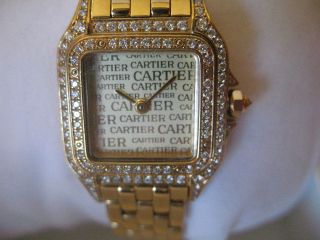Rare Cartier Panther Diamond watch and a rare gold dial