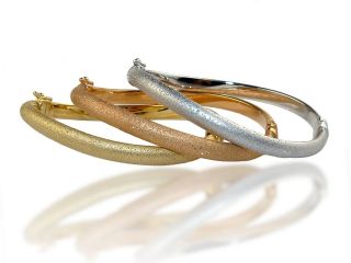 Charles Garnier 18K Gold Tiffany Wave Bangle Bracelet