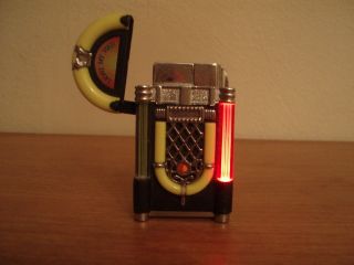   box lighter refillable cast medal with plastic pieces very nice