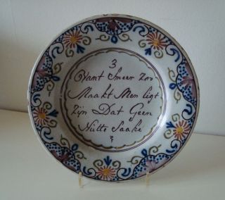 quite unusual c.1800 polychrome Dutch Delft Plate with text