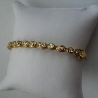 Estate Doris Panos 18k yellow gold diamond bracelet
