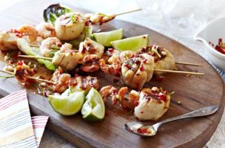 Scallop and prawn kebabs with chilli and lime dressing