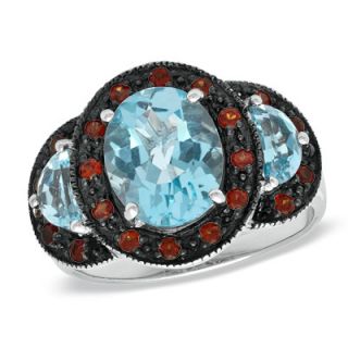 Oval Swiss Blue Topaz and Garnet Three Stone Ring in Sterling Silver 