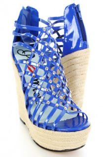 Home / Blue Patent Strappy Caged Studded Platform Wedge Sandals