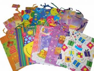 10 inch x 13 inch. 12 assorted large birthday gift bags with rope 