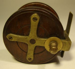 ANTIQUE WOOD AND BRASS 2 1/2 STAR BACK FISHING REEL