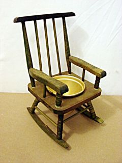 SMALL OLD STYLE ROCKING CHAIR WITH METAL CUP IN THE SEAT