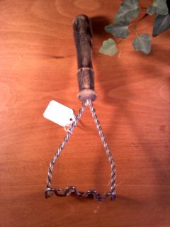 vintage kitchen utensil twisted wire Potato Masher black wood handle
