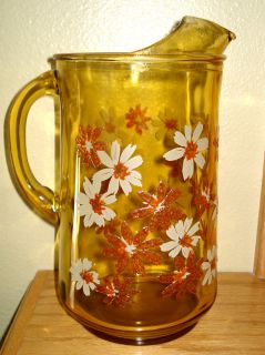 VINTAGE~AMBER GLASS Pitcher w/Painted Embossed Daiseys  10 1/2 tall 