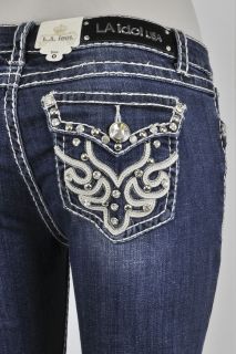 LA Idol Skinny Jeans With A Fabric Design And Rhinestone Buttons.