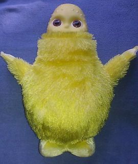   Humbah Hop14yellow vinyl head plush. Moves and makes silly sounds