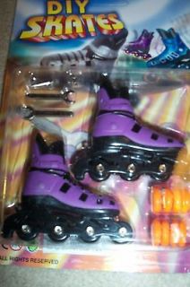 nip toy purple finger skates rollerblades w tools one day