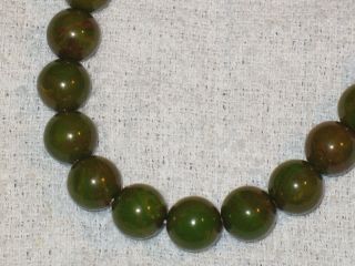 nice 1940s olive green red bakelite necklace great time left