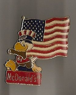   American Flag with Olympic Mascot and McDonalds old enamel pin