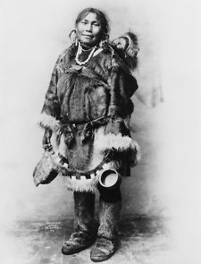 1903 photo Eskimo mother dressed in fur clothing with baby on her back 