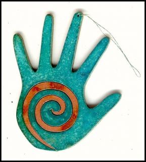 coppercutts hand with spiral ornament southwest copper returns 