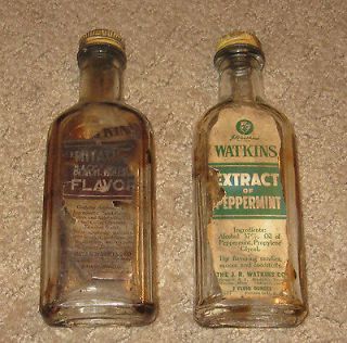 Two Watkins Extract Bottle 2oz Labeled and bottle embossed with 