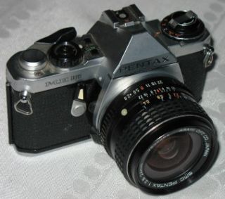   ME SUPER 35mm SLR Film Camera w(2) 50mm Lenses, 24mm Lens, LOWE Bag
