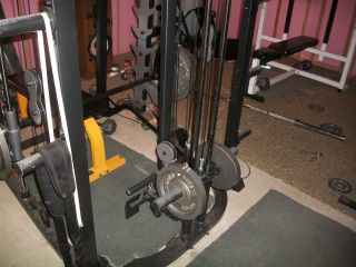 weight lifting equipment smith machine bench press flat bench dumbells 