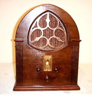 Antique General Motors vintage tube radio in cathedral cabinet 