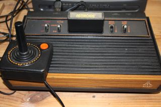 Atari 2600 4 switch Console with lot of 35 Different Games   Tested 