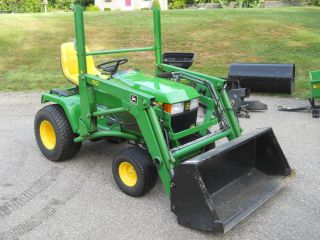 John Deere 445 Low Hours with Bucket Loader and Several Attachments 