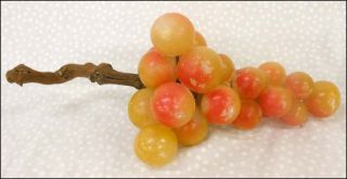 This is great set of Painted Alabaster Grapes . Carved to graduating 