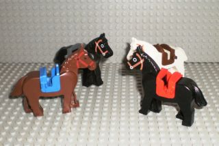 FOUR LEGO HORSES WITH SADDLES LEGOS ANIMAL FIGURES WESTERN LOT
