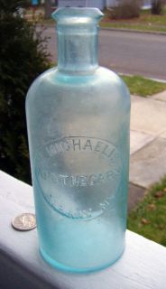   bottle embossed C. Michaelis Apothecary Albany N.Y. cylinder