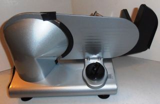 this listing is for a new in box deni electric food slicer model 14150
