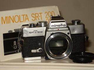 Minolta SR T202 Camera Body 2560385 with Cap and Manual Made in Japan 