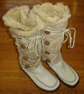 Boots are 15 tall including heels and shearling trim. Bottom length 