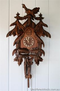 Master Carver Hand Carved Pine Tree Cuckoo Clock