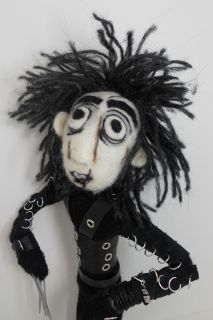 Edwards body is needle felted with core wool over a hand made 