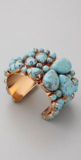 cuff this stone laden cuff shines in one of spring s best colors pair 