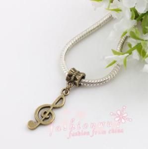 100 Pcs Ancient Bronze Plated Music Note Charm Beads 1