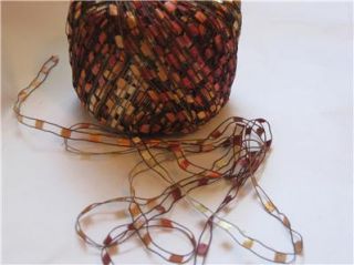 This is a gorgeous mini ladder trellis ribbon yarn from Ice. Yarn