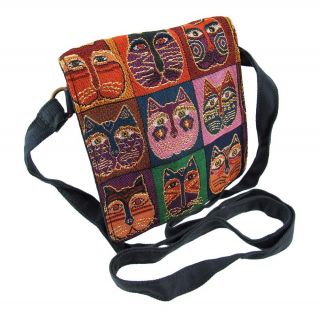 this cute crossbody bag features the whimsical artwork of laurel burch