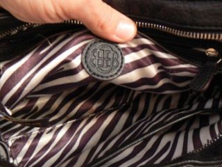 dana buchman black purse zipper top and zipper pocket inside i am not