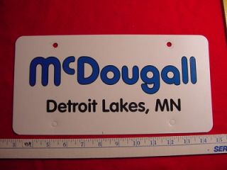 McDougall Detroit Lakes MN Car Dealer Plate Tag Emblem
